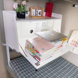 The desk on the dormitory bed can be raised and lowered to increase the student dormitory artifact. The lower bunk is a lazy study folding computer table.