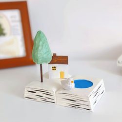 Small House Made of Wood Carving on the Book's Pages, Handmade Wooden Tabletop Still Life Ornament, Decorative Item, Photography Prop