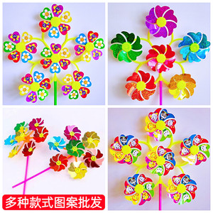 New best selling outdoor children's toys kindergarten decoration activity ground push rotating sequins colorful smiling face windmill
