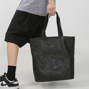Men's Tot Bags Fashion Tide Brand Pack Cowbon Paper Waterproof Nothing Niche Significant Design Sense Large -capacity Commuters Shoulder Bags