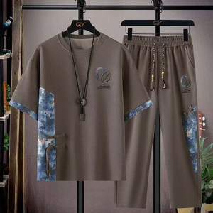 
New summer casual sports suit for teenagers fashionable high-end new Chinese short-sleeved T-shirt trousers two-piece set