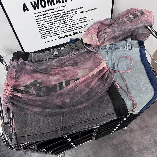 Design-sensible mesh splicing denim skirt for women in summer high-waisted A-line high-end hip-pack skirt skirt
