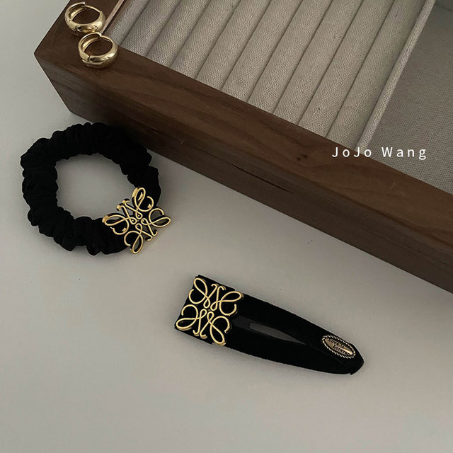 Middle -aged small practical ~ black gold set rings headwear high bombs tie the hair decoration back brain plate head head head head rope South Korea