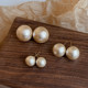 Retro cotton pearl earrings for women 2025 new popular autumn and winter earrings light luxury high-end unique silver needle earrings