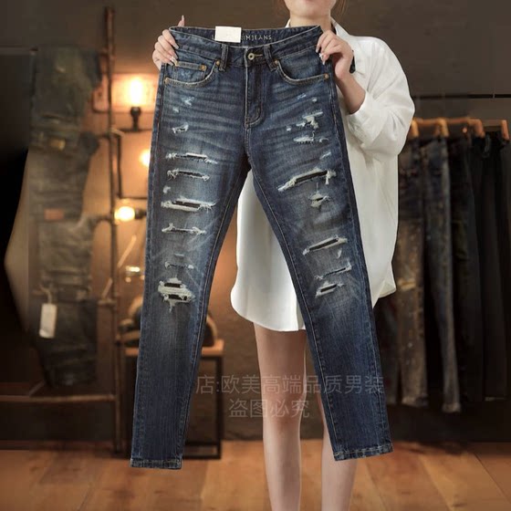 
High-end original autumn and winter designer men's jeans blue hole patch personality trendy slim fit small feet elastic