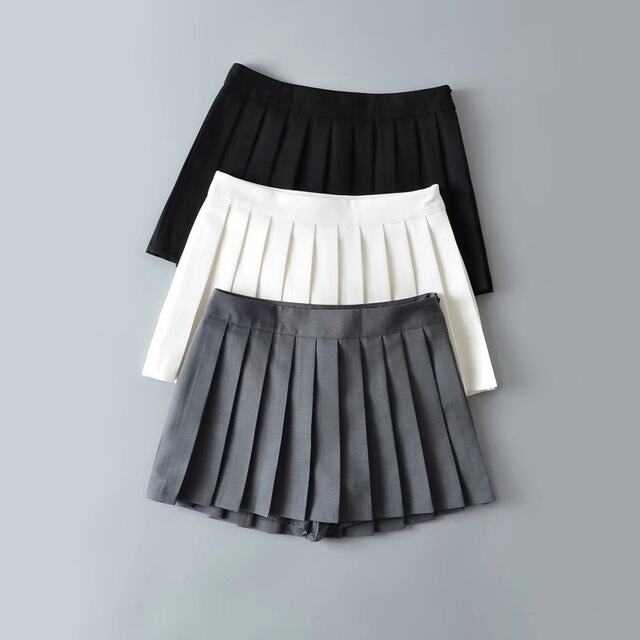 2023 autumn TB ultra-short pleated skirt short front and long back anti-exposure high waist slimming A-line half-body short skirt for women
