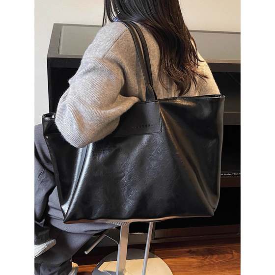 
Large capacity casual commuting tote bag women's solid color PU fitness travel bag hand shopping bag men's school shoulder bag