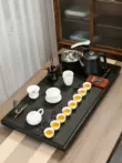 Toàn bộ khay trà bằng đá vàng đen Bộ trà Kung Fu hộ gia đình hoàn toàn tự động tất cả trong một ấm đun nước bàn trà trà đá biển bộ hoàn chỉnh