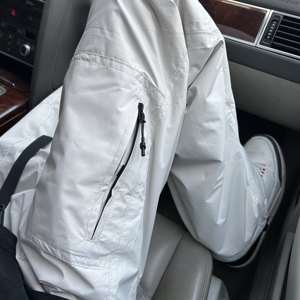 
Down outdoor thickened windproof and waterproof warm snow pants for men and women autumn and winter pants outdoor sports assault soft shell pants