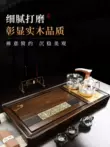 Bộ khay trà bằng gỗ đàn hương đen tất cả trong một hoàn toàn tự động ấm đun nước kung fu trà hộ gia đình gỗ nguyên khối bàn trà nhỏ bàn trà điện thông minh giá rẻ Bàn trà điện