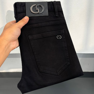 Autumn new pure black jeans men's European and American simple leisure versatile body small feet young elastic pants