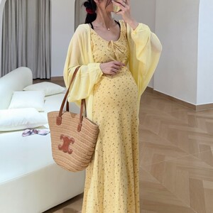 
HAIDE mommy maternity wear, Korean style, sweet, gentle and energetic, goose yellow floral vest long skirt maternity skirt