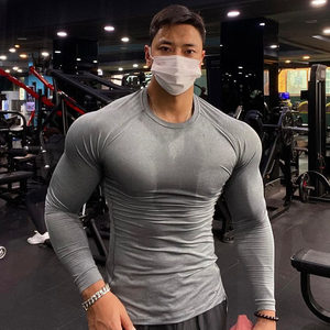 Fitness long -sleeved muscle men tight clothes brother T -shirt fast dry high elastic sports top compressing training solid color