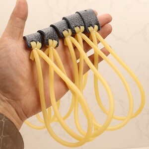 
3050 high elastic slingshot rubber band traditional old-fashioned durable elastic high elastic fire paint seal steel ball three cards