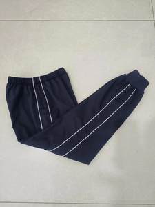 Customized pure cotton school uniform and pants for primary and secondary school students, deep navy blue with 2 white thin strips and tight mouth for casual sports
