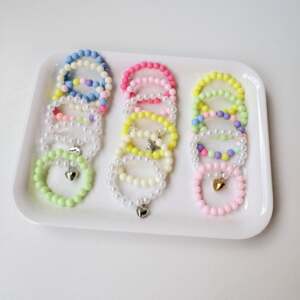 
New 10cm doll dolls suitable for mini pearl necklaces with elastic color bead necklaces toys