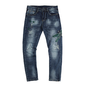 
Dragonfly embroidered hole made of old cat whisker grinding white water washing jeans elastic small feet men and women trousers 1842