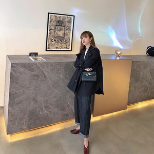 
LANGBOOM Japanese brand spliced ​​sleeve layered texture khaki small trench coat for women