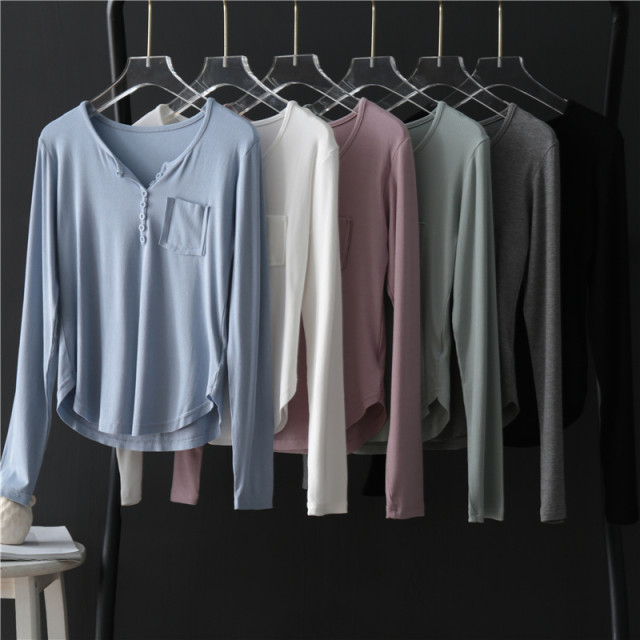 Mao -edge pocket arc swinging long -sleeved T -shirt female summer 2025 new slim round neck thread cotton bottom shirt