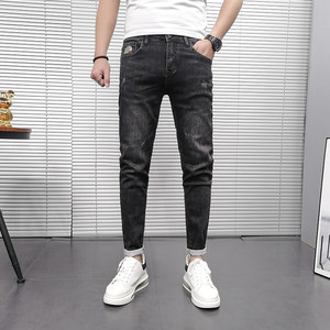 
European station high-end embroidered slim fit jeans for men, black velvet nine-point pants for autumn and winter, new style, versatile and trendy