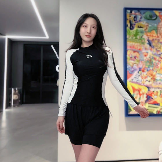 
Xiaojie swimsuit [split lengthened five-quarter pants] fixed cup conservative fat 200*0.5kg fashionable belly covering and slimming