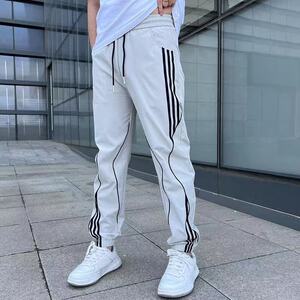 
Spring and summer men's trendy casual pants men's loose stretch sports pants elastic waist striped stitching leggings pants