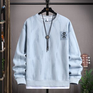 
Spring and autumn round neck sweatshirt for boys junior high school long-sleeved bottoming shirt for teenagers and older children fake two-piece T-shirt top