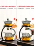 bàn uống trà điện Bộ trà tự động bằng thủy tinh, ấm trà từ tính gia dụng mới, hiện vật pha trà kung fu lười, nhẹ sang trọng và cao cấp hướng dẫn sử dụng bàn trà điện Bàn trà điện