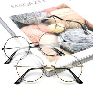 Ultra -light Korean round -frame glasses female full -frame classical flat light mirror men's tide retro radiation anti -radiated myopia Ulzzang