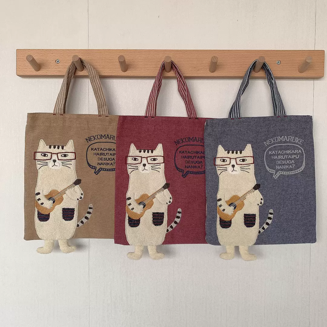 Ty25 Acc 日本kusuguru 刺绣猫咪正反面ipad手提收纳包街拍网红