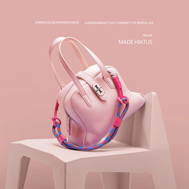 Hiatus Korean version of niche design weaving contrasting color shoulder strap dumpling dumplings bag underarmed litchi pattern simple shoulder shoulder bag
