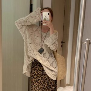 
Retro niche hollowed-out lightweight sweater, cool, loose, slim and sexy V-neck braided pattern long-sleeved blouse