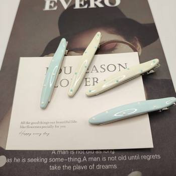 
Cream blue and white polka dot hair clip for women Korean style