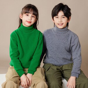 
Children's cardigan turtleneck 2025 new winter style boy knitted sweater solid color girl thick sweater medium big children