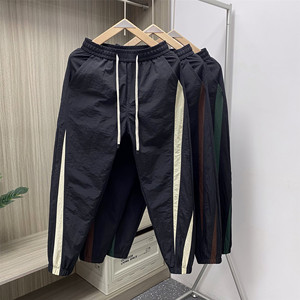 Summer thin casual pants men's loose striped stripe stitching small feet nine -point pants, handsome tide brand fast dry beam Harn pants