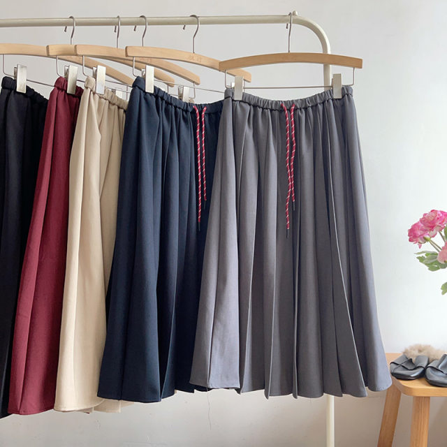 Thirteen Lines Autumn New Korean version solid color Korean version rubber waist pleated skirt mid-length women's skirt lace-up versatile umbrella skirt