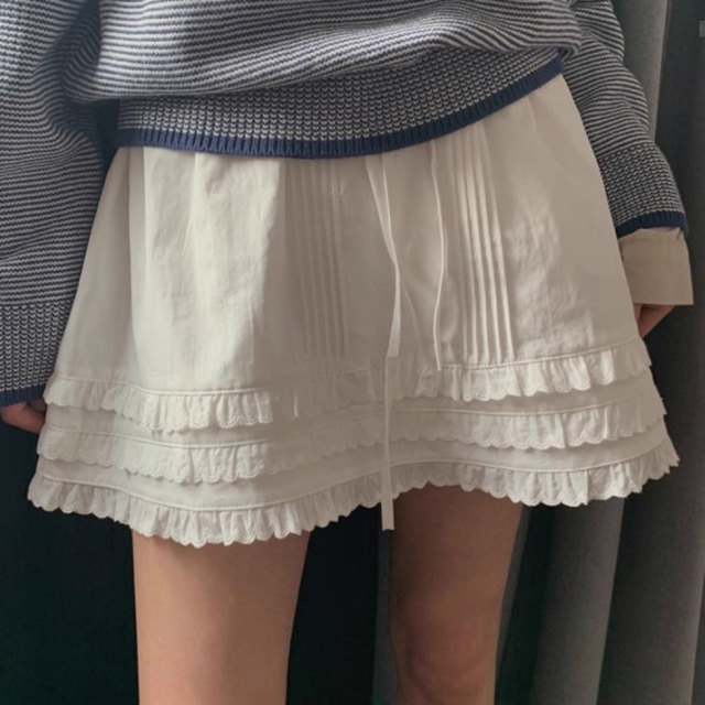 South Korea Dongdaemun Spring 2025 new sweet and fashionable lace-up high waist pleated lace skirt women's short skirt trendy
