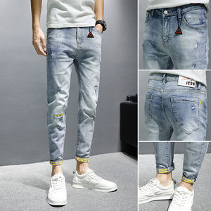 
Ripped jeans men's trendy brand 2025 summer new slim wash casual versatile elastic tiny feet nine-point pants