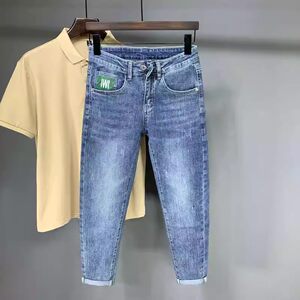 Nine -point jeans men's summer thin models slim -fitting pants elastic high -end trendy brand casual wild pants men
