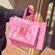 Laminated non-woven bag Customized gift bag Thicken environmentally friendly bag Fashion new style clothing handbag wholesale New Year bag

