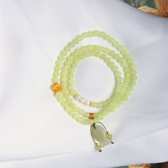 
Natural Hetian jade yellow mouth material bead chain with small fish pendant original three-circle bracelet women's jade bracelet