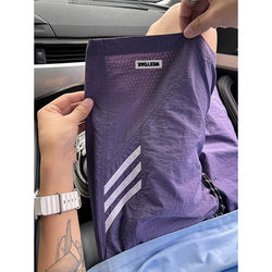 Shorts men's summer 2025 new three-stripe quick-drying breathable casual pants Hong Kong style loose trendy brand sports five-point pants