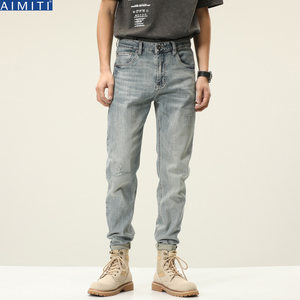 
High-end light-colored jeans for men, spring and autumn slim straight long pants, American retro stretchy simple ripped tapered pants