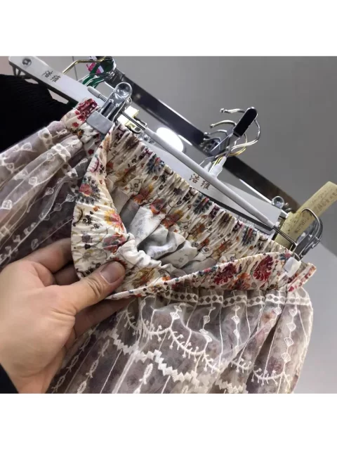 Fashionable elastic high waist heavy industry embroidered mesh spliced ​​A-line skirt European station spring and summer women's new style 2025