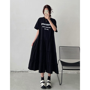 
Black splicing dress women's mid-length 2026 summer new style French loose age-reducing design t-shirt skirt