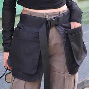 
Niche multi-functional men and women universal multi-zipper pocket waist seal outdoor sports and casual black fabric apron waist bag