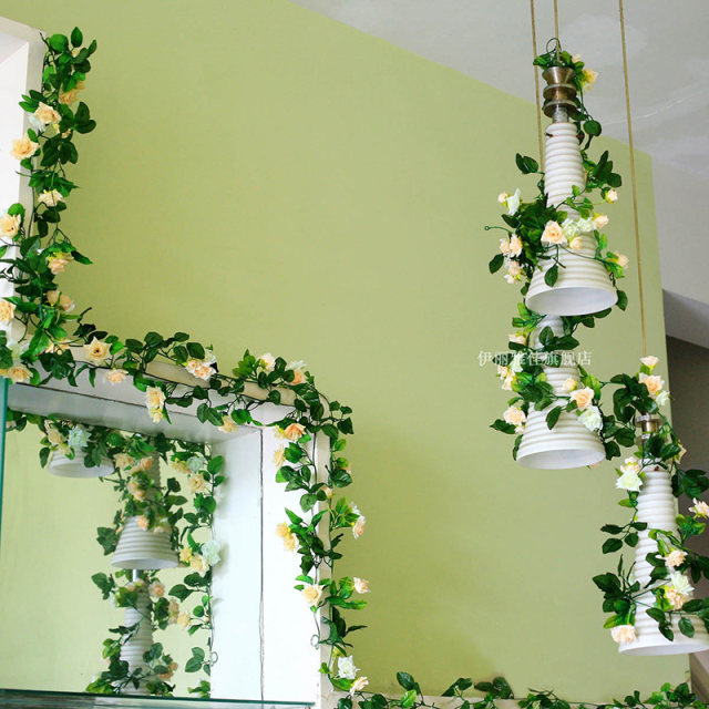 Simulated plants, roses, artificial flowers, rattan wedding arches, stair handrails, air-conditioning pipes, winding and blocking ceiling decoration