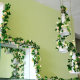 Simulated plants, roses, artificial flowers, rattan wedding arches, stair handrails, air-conditioning pipes, winding and blocking ceiling decoration