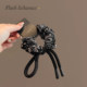 
Retro pattern black small intestine circle high-end texture hair rope headwear 2025 new bow knot ponytail headband