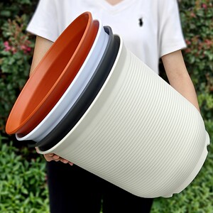 
New imitation ceramic flower pot thickened breathable high tube round balcony large green plant potted resin pot with root control high style